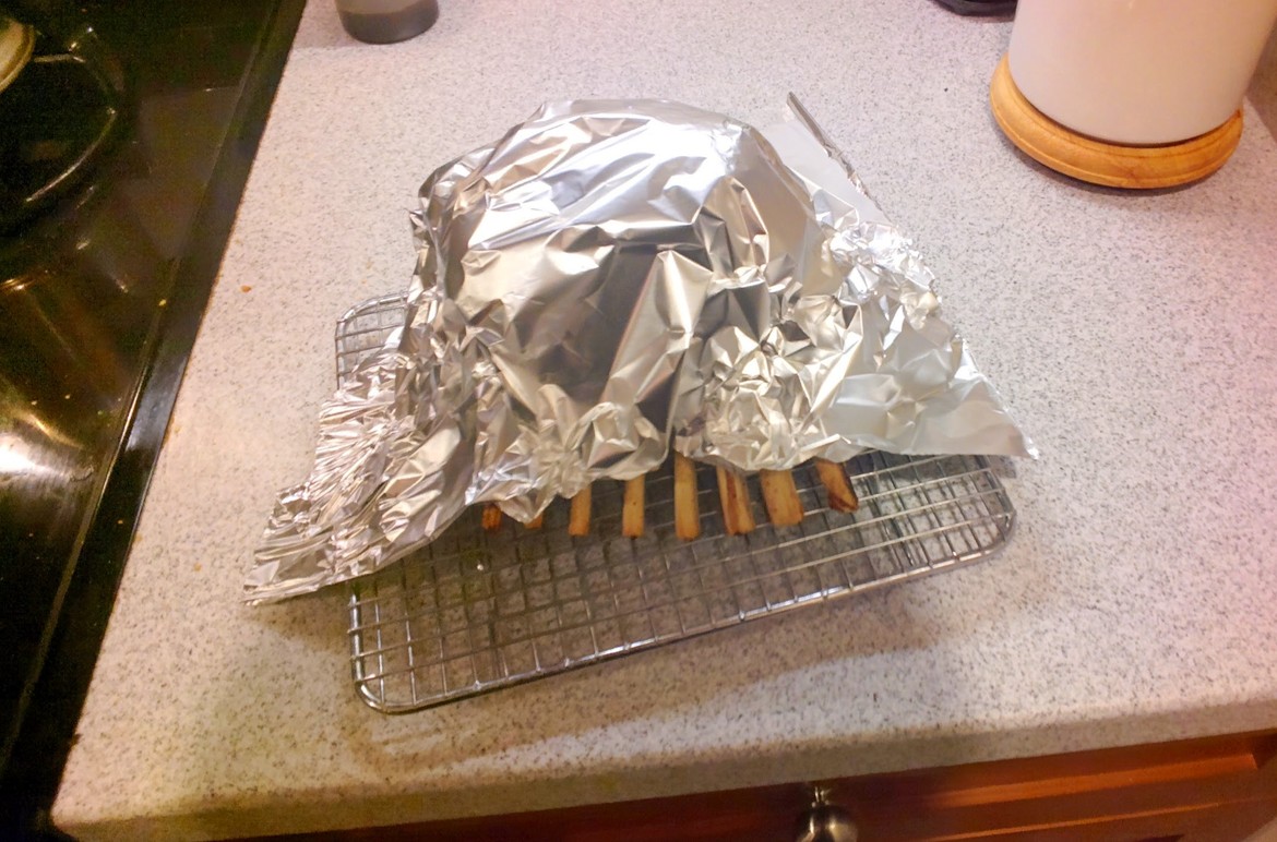 Foil covered rack of lamb